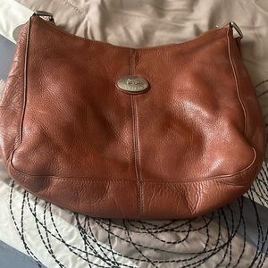 Hobo style purse.  Has no used marks. No smoke no pet household